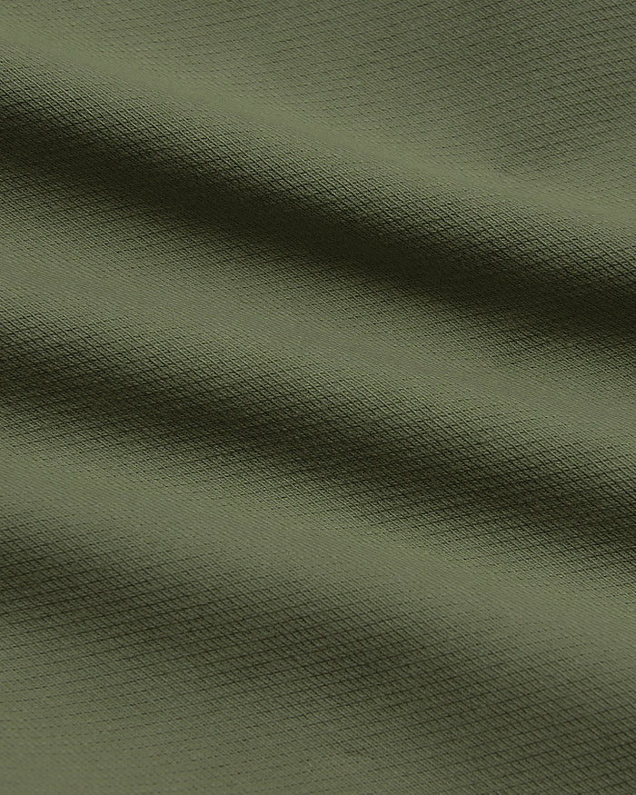 9 Military Green Chino Shorts 2.0 with textured fabric folds.