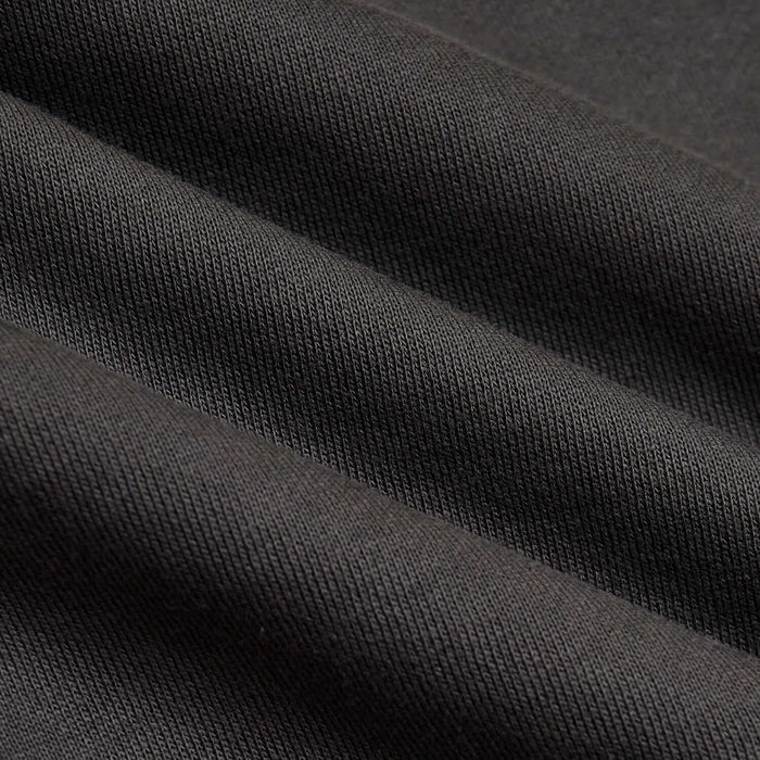 Carbon Fleece French Terry Joggers fabric close-up showing knit texture.