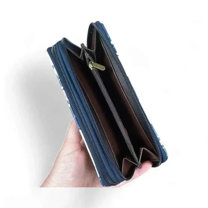 Cotton Road large wallet in navy blue PU leather with pink floral design and double zip compartments for cards and coins