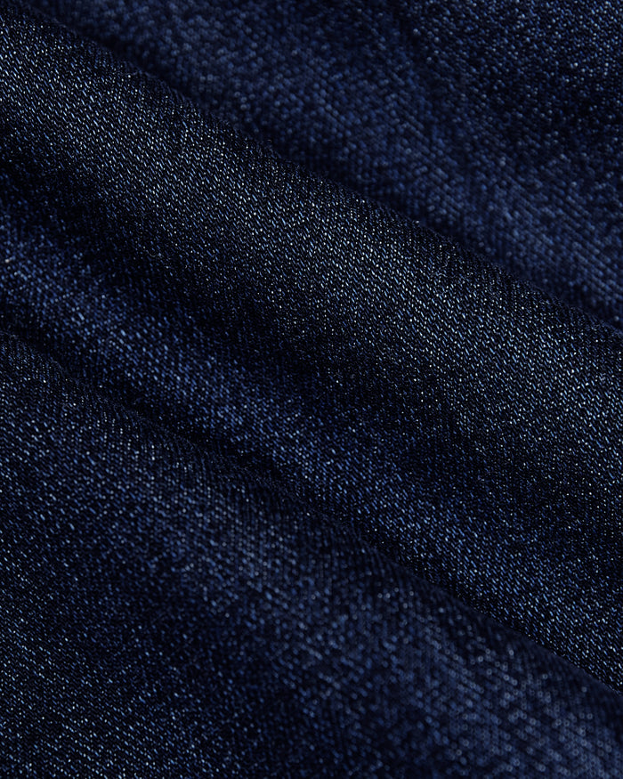 Indigo Wash Straight Comfort Stretch Jeans close-up, showing denim's diagonal weave.