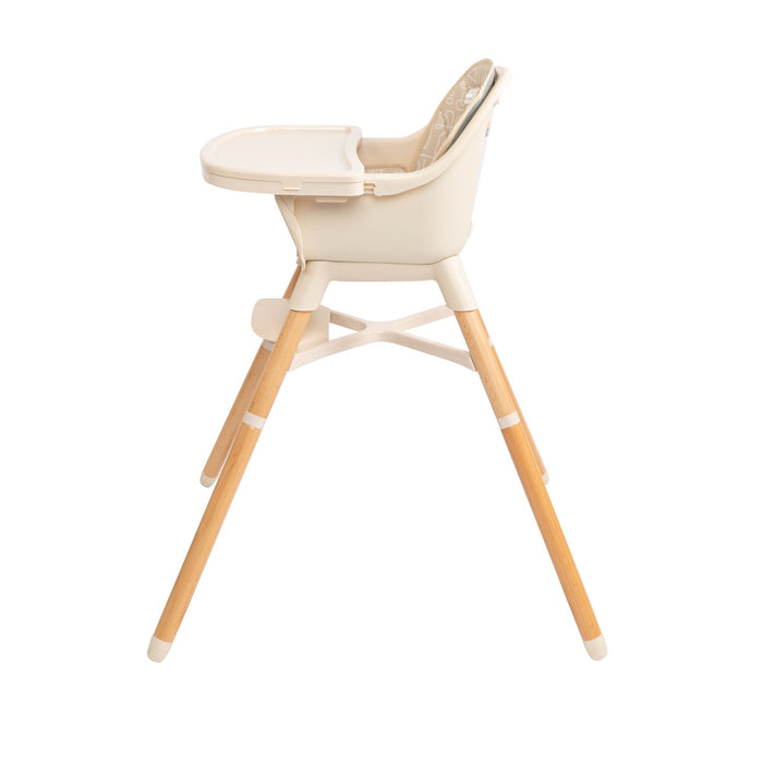 The Nuby 4-in-1 Multi-Use High Chair | Beige Lines features a white plastic seat, a detachable tray, and light wooden legs. It’s shown in a side view against a plain white background and is designed to grow with your child.