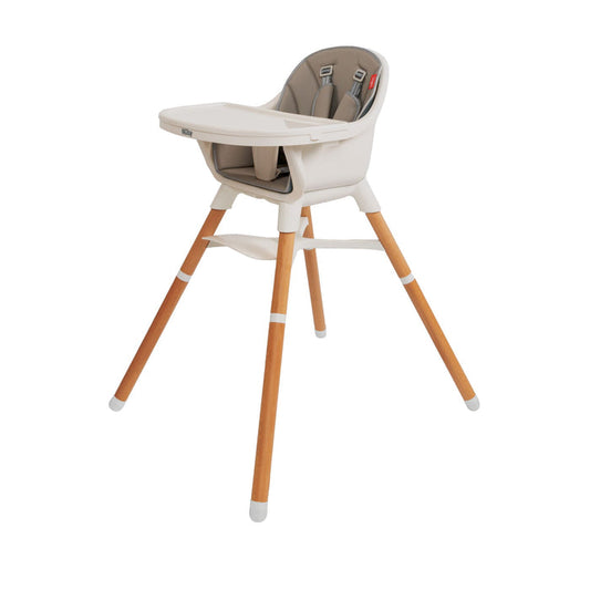 The Nuby 4-in-1 Multi-Use High Chair in Dark Beige features a white seat, beige cushioning, safety harness, wooden legs, white footrest, and removable tray. Its minimalistic design is functional and adapts as your child grows.