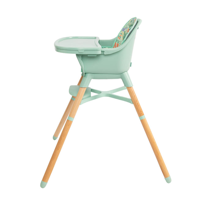 The Nuby 4-in-1 Multi-Use High Chair | Green Garden features a modern mint green design with wooden legs, tray table, and a colorful patterned seat cushion to grow with your child, shown against a white background.