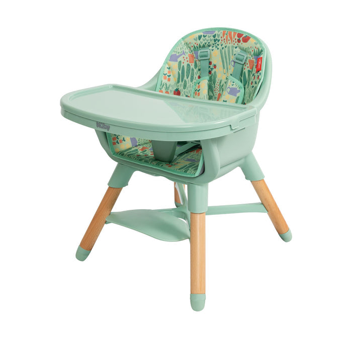 The Nuby 4-in-1 Multi-Use High Chair | Green Garden features a mint green design with wooden legs, a seat patterned with colorful nature illustrations, and a detachable tray to grow with your child.
