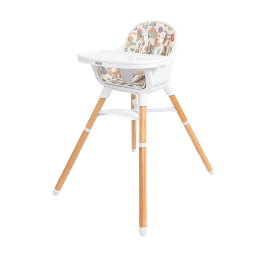 The Nuby 4-in-1 Multi-Use High Chair | White Geometrics features light wooden legs, a white seat and tray, and a vibrant geometric cushion. It adapts as your child grows for modern versatility and comfort.