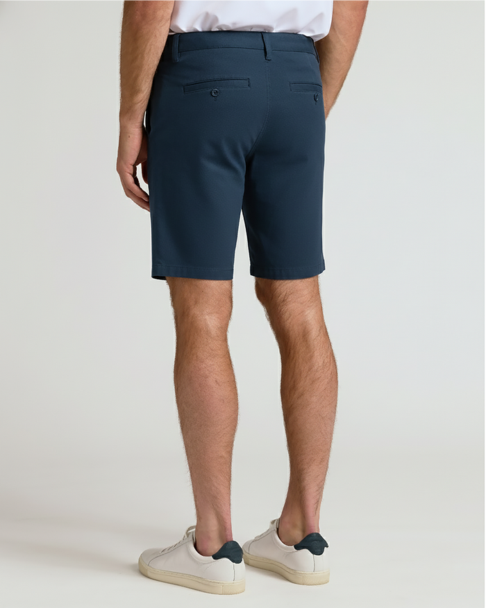 7 Navy Chino Shorts 2.0, tailored with button-flap back pockets.