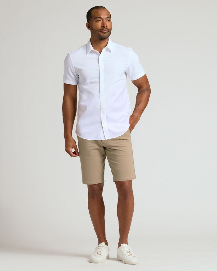 Man wearing the 9 Black & Khaki Chino Shorts 2-Pack.