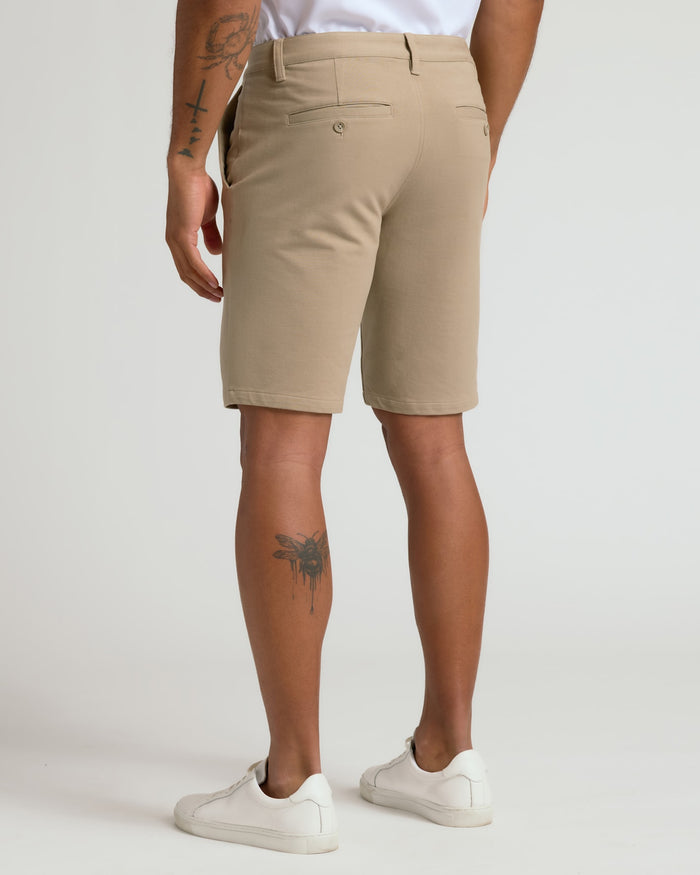 9 Black & Khaki Chino Shorts 2-Pack worn with sneakers.
