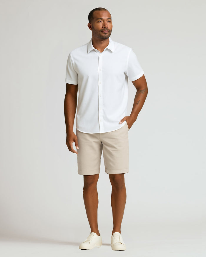 Man in 9 Sandstone Chino Shorts 2.0 with white shirt.