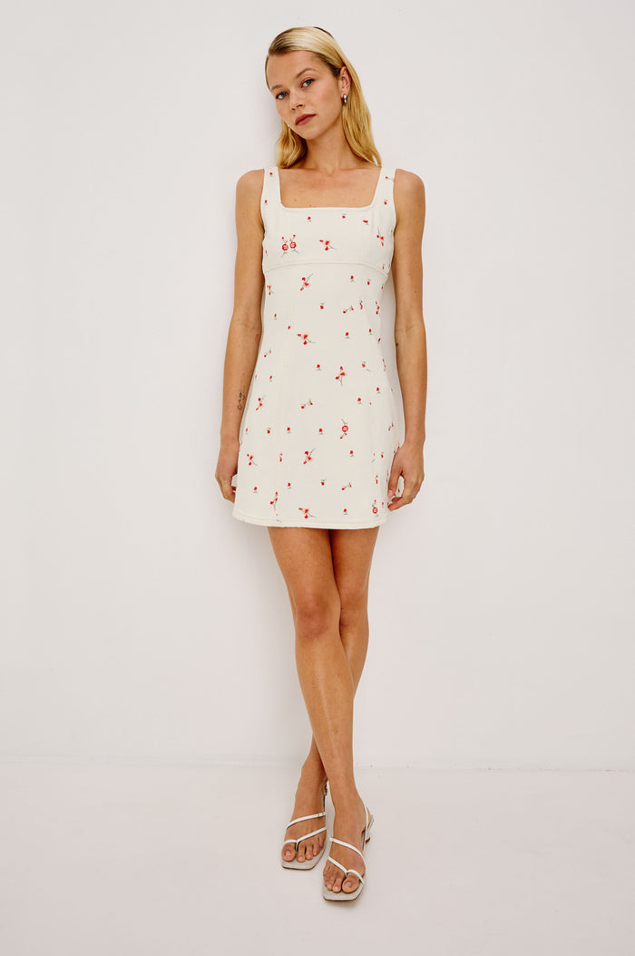 Altadena Mini Dress in Light Stretch Denim With Sleeveless Square Neckline and Back Zip Closure in Ecru Romantic Floral Colorway - Full Body Front View Featured on Model