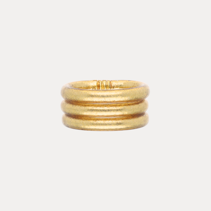 Aura All Weather Rings (Set of 3) in luminous Aura Gold, featuring three stacked rings for versatile styling.