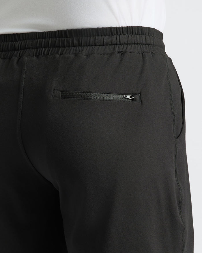 Black Active Comfort Shorts with zippered back pocket and elastic waistband.