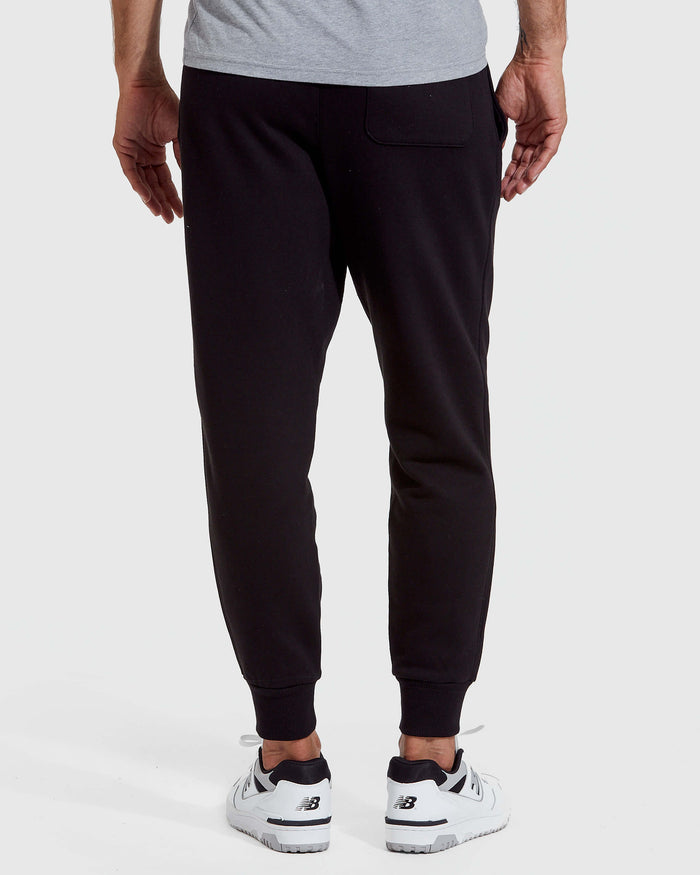 Black Fleece French Terry Joggers worn with white sneakers.