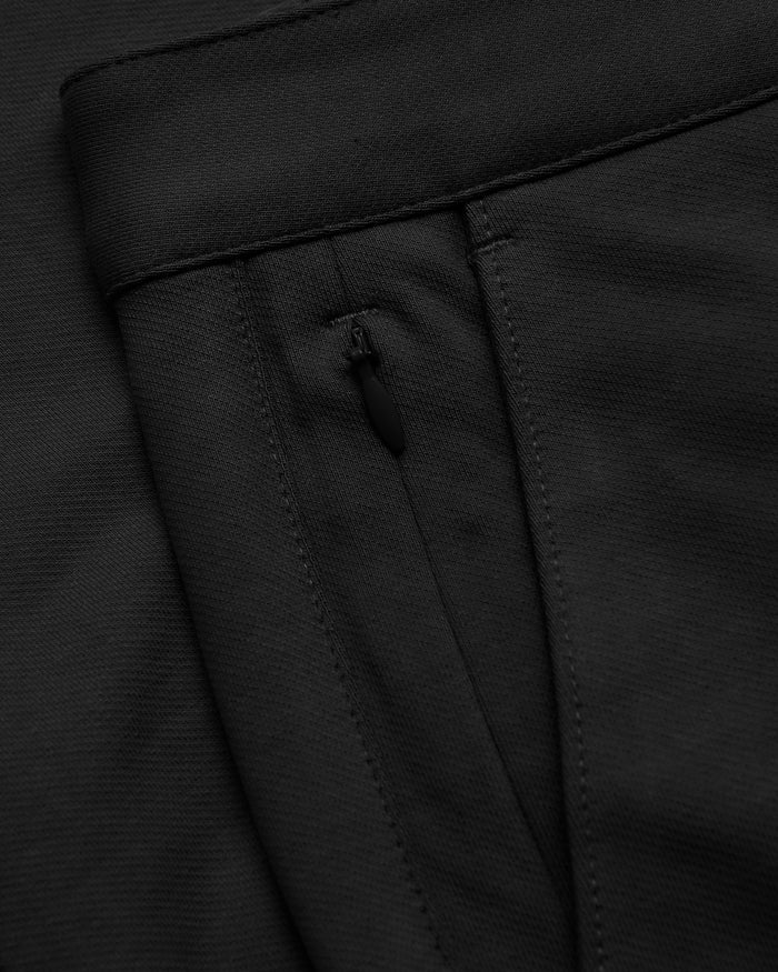Black Slim Chino Pants 2.0 waistband with textured fabric and zipper.