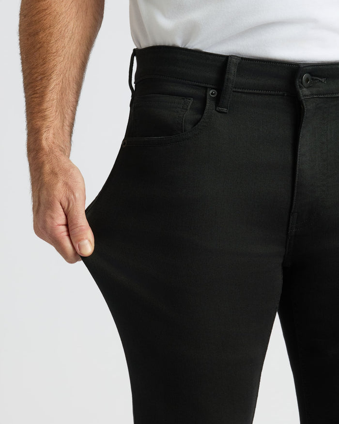 Black Wash Slim Comfort Stretch Jeans showing stretch and flexibility.