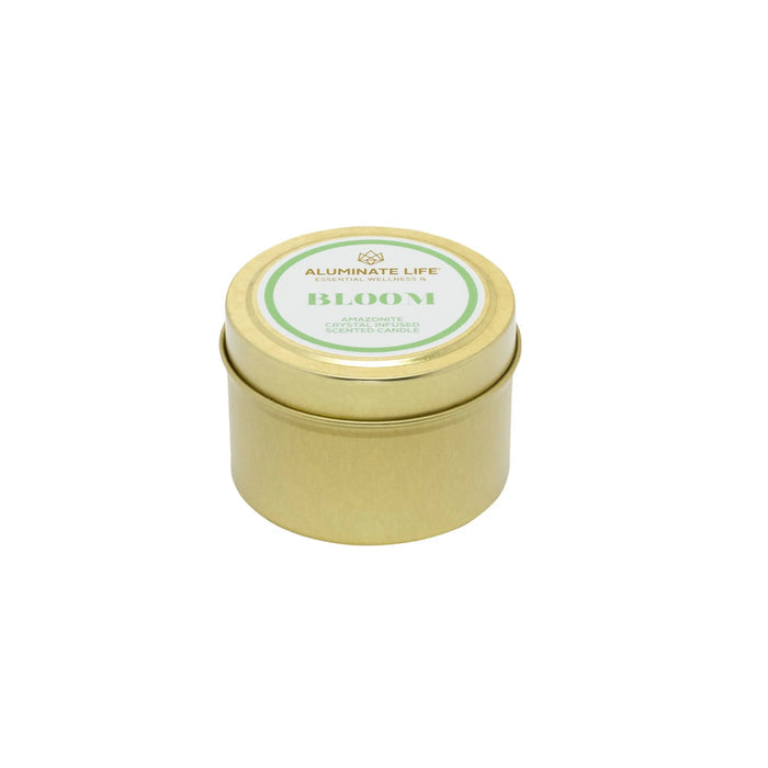 Closed gold tin candle featuring a green and white labeled lid, showcasing the Bloom Candle Tin | Aluminate Life for a relaxing wellness experience.