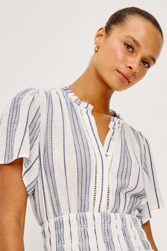 Brent Maxi Dress in Luxe Linen With Front Half Placket, Ladder and Ruffle Trim, Short Wide Sleeves, Smocked Waist, Single-Tier Hem in Salino Stripe Colorway - Upper Body Front View Featured on Model