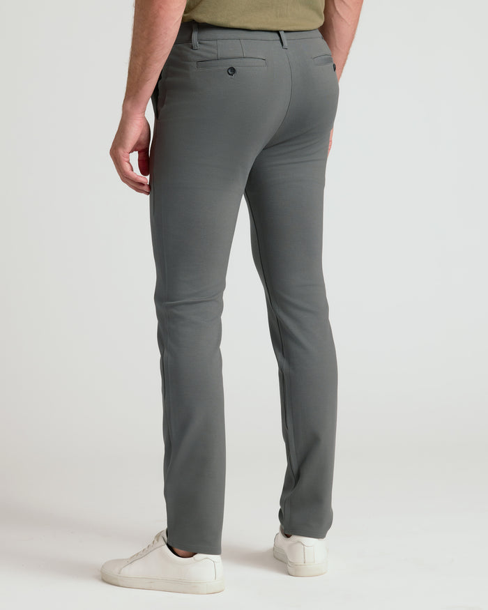 Carbon Slim Comfort Knit Chino Pant, back view, showcasing fit and pockets.
