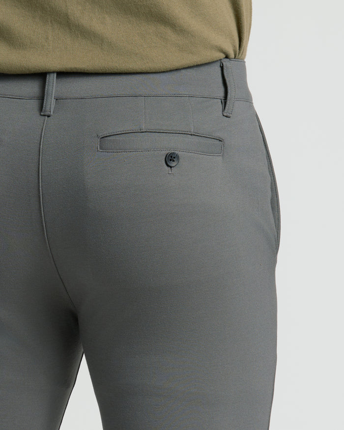 Carbon Slim Comfort Knit Chino Pant with shirt tucked in.