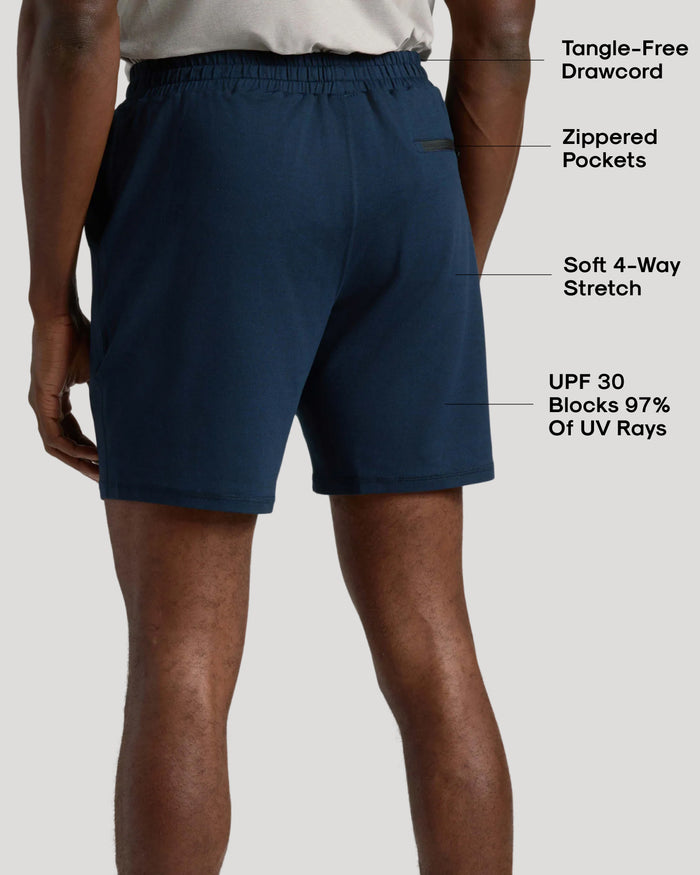 Man wearing Charcoal & Dark Heather Navy Active Comfort Shorts, rear view.