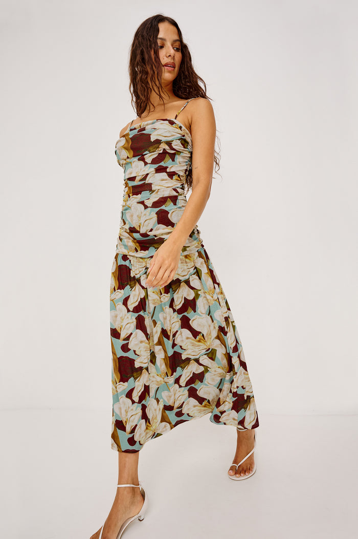 Dolly Maxi Dress in Self-Lined Mesh With Adjustable Spaghetti Straps, Straight Neckline, Ruched Body, and Full Skirt in Plumeria Colorway - Full Body Front View Featured on Model