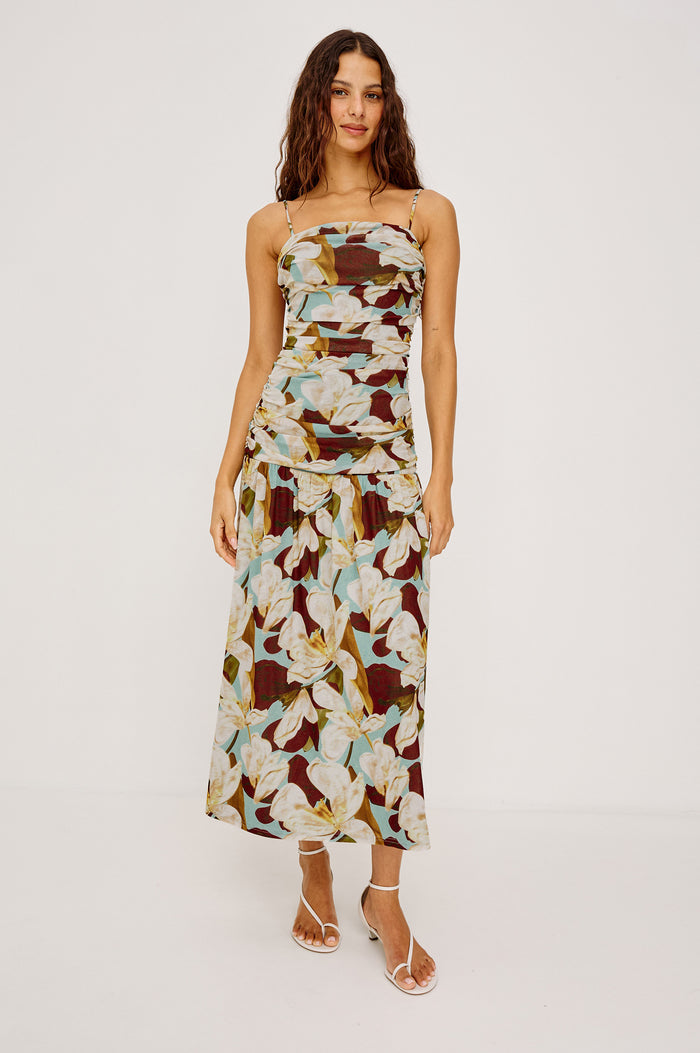 Dolly Maxi Dress in Self-Lined Mesh With Adjustable Spaghetti Straps, Straight Neckline, Ruched Body, and Full Skirt in Plumeria Colorway - Full Body Front View Featured on Model