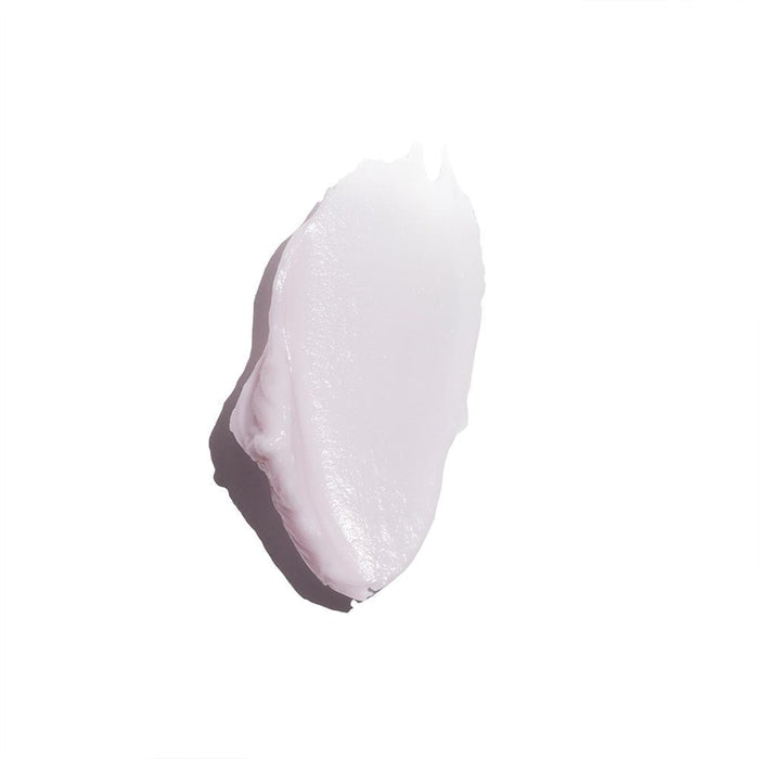 Close-up of a smooth pale pink cream texture sample representing Full Spectrum 360° Day SPF 30 & Night Organic Eye Cream Duo | COOLA skincare product for delicate eye care.