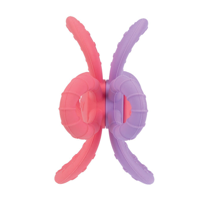 The Nuby Fun Loops Teether | Pink/Purple features two interlocking silicone rings with textured, curved arms, offering soothing relief as babies chew and play.