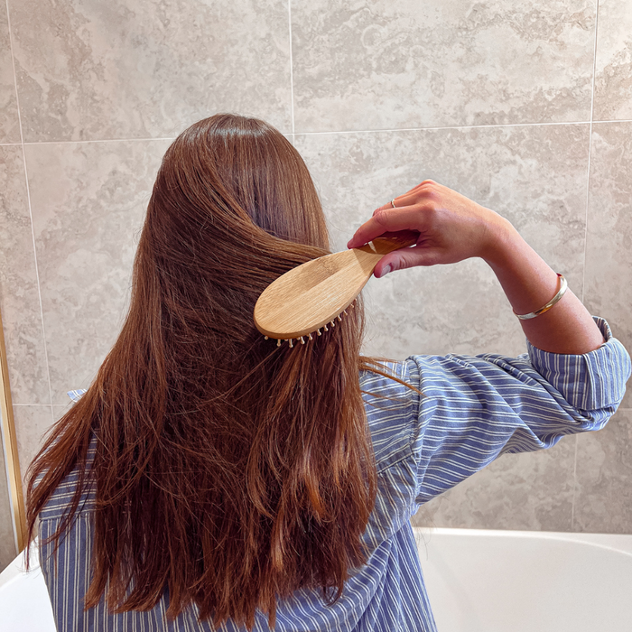 Go-For-Zero-Australia-Bamboo-Hair-Brush-Travel-Size-In-Use
