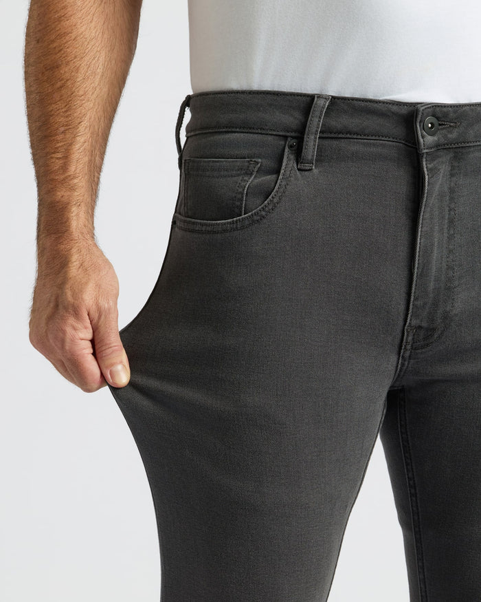 Gray Wash Slim Comfort Stretch Jeans showcasing stretch and classic design.