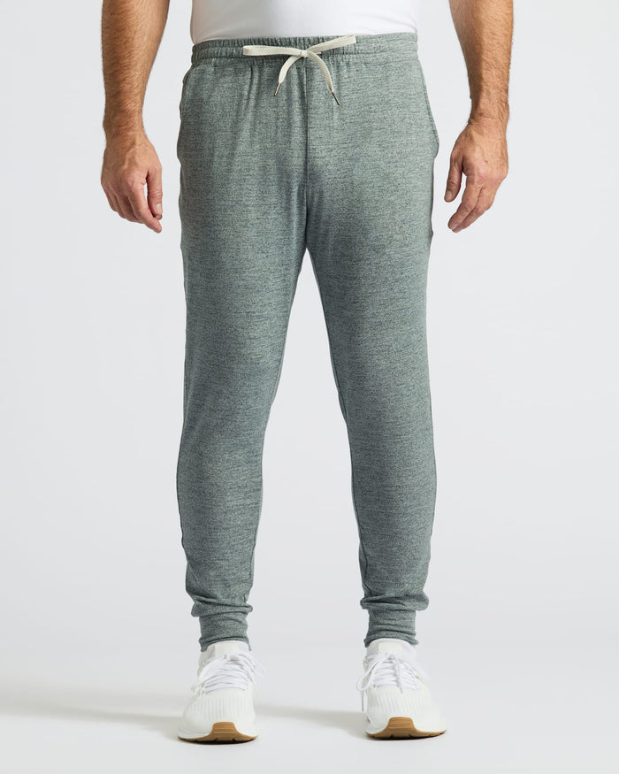 Heather Gray Active Joggers with white sneakers on a plain background.