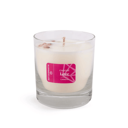 I Choose Love Candle | Aluminate Life in a clear glass container with a pink label, featuring white wax and a single wick, styled for a calming wellness atmosphere.