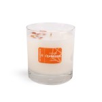 I Choose Optimism Candle | Aluminate Life in a clear glass with a white wax base and decorative orange petals, creating a calm and uplifting ambiance.