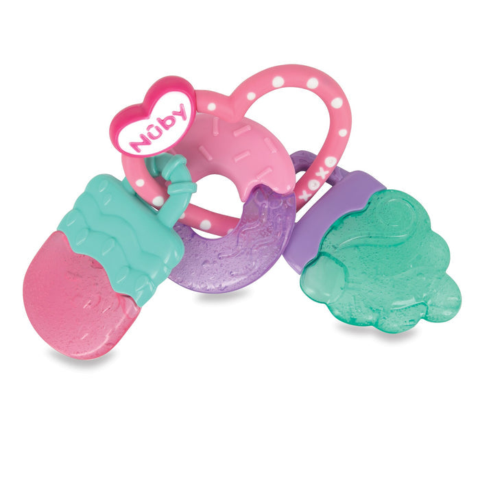The Nuby IcyBite Sweets Teether Toy features three textured charms—an ice cream, a purple donut, and a green cloud—plus a pink heart labeled “Nuby” on a bright pink and white handle for soothing teething relief.