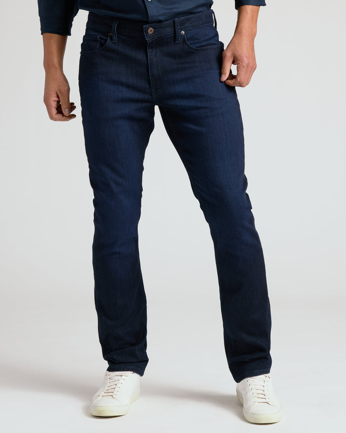Indigo Wash Straight Comfort Stretch Jeans with white sneakers.