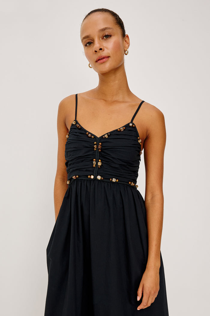 Ivana Maxi Dress in Cotton Poplin With Adjustable Spaghetti Straps, Ruched Bodice With Braided Trim and Beaded Embellishments, and Full Skirt in Black Colorway - Full Body Front View Featured on Model