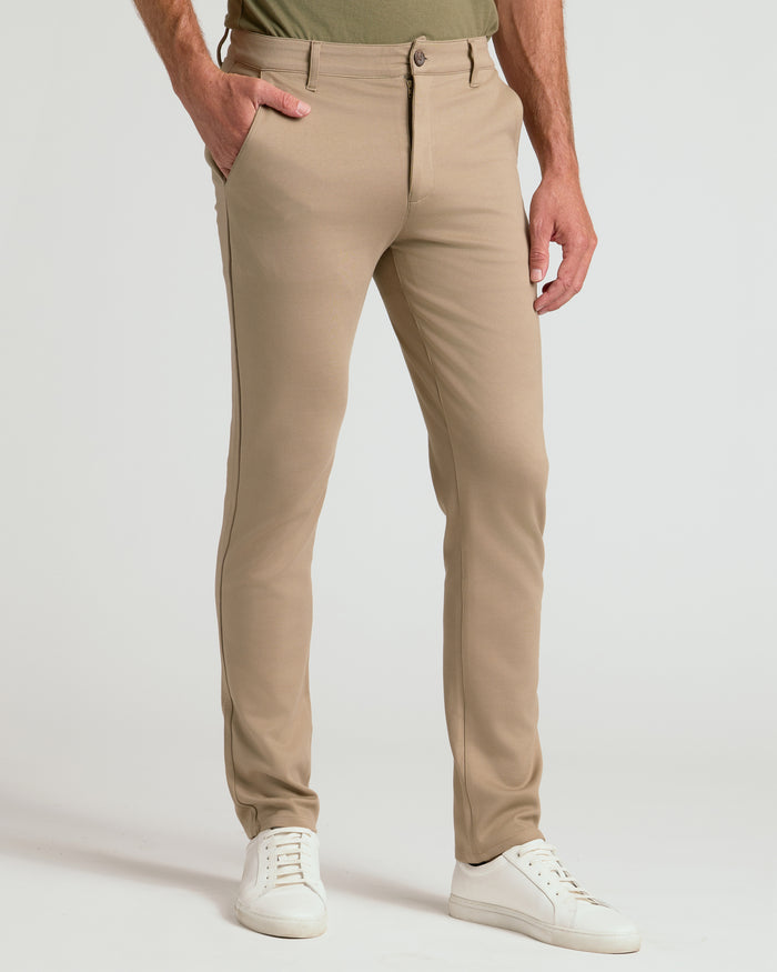 Khaki Slim Comfort Knit Chino Pant with white sneakers.