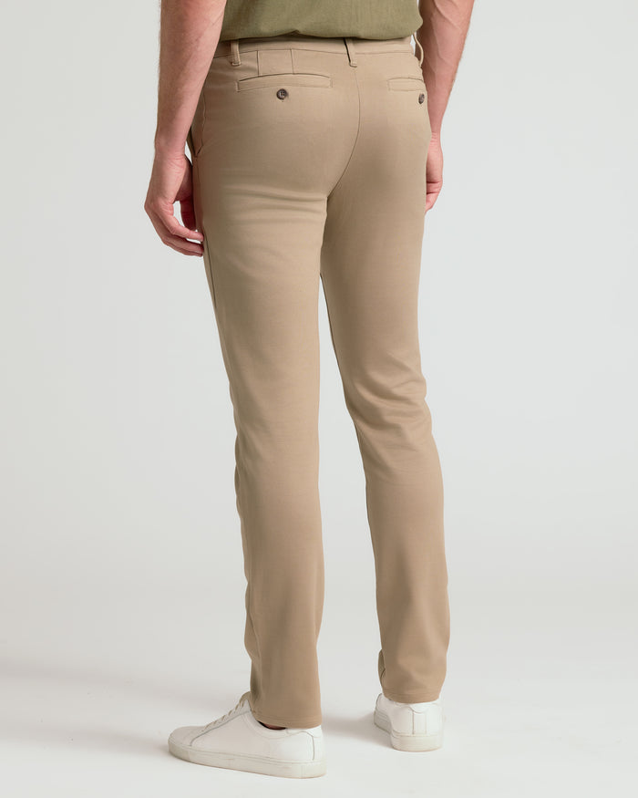 Khaki Slim Comfort Knit Chino Pant with back button-flap pockets.