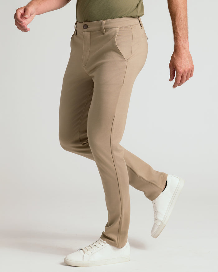Khaki Slim Comfort Knit Chino Pant with white sneakers.