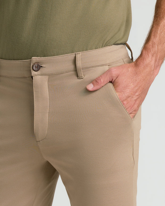 Khaki Slim Comfort Knit Chino Pant with hand in pocket.