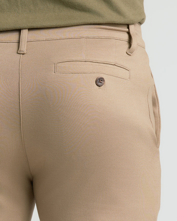 Khaki Slim Comfort Knit Chino Pant rear with buttoned back pocket.