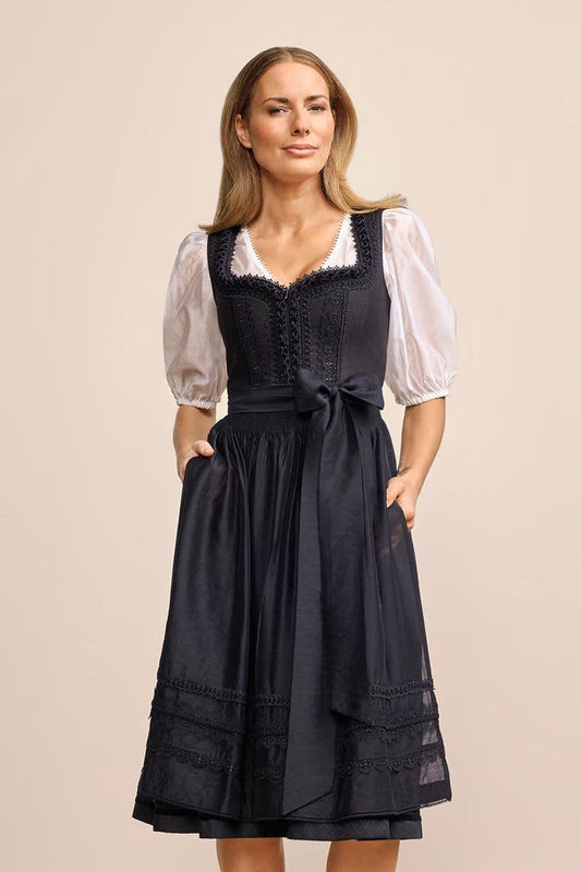 Kruger Long Dirndl 2pcs. 70cm "Verity" in black, elegant design, tailored cut, subtle apron, below-knee length.