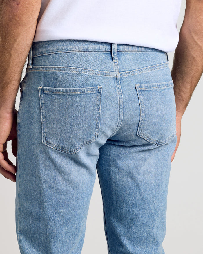 Light Indigo Wash Straight Authentic Denim Jeans rear view with back pockets.