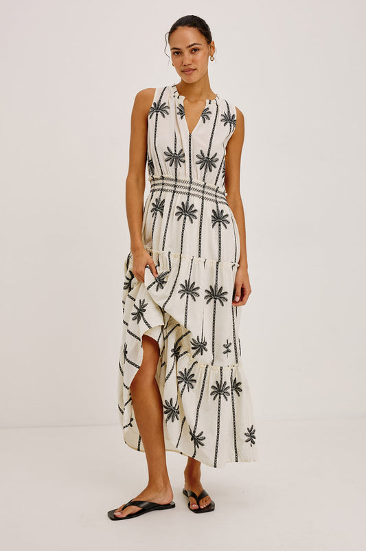 Loulou Maxi Dress in Cotton Voile With Ruffle Trim, V-Neck, Smocked Waist, and Ruffle Tier Skirt in Embroidered Palms Colorway - Full Body Front View Featured on Model