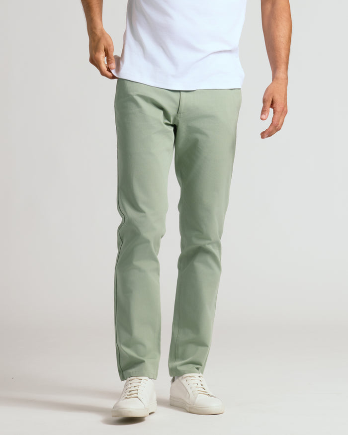 Meadow Slim Twill Chino Pant with sneakers and white T-shirt.