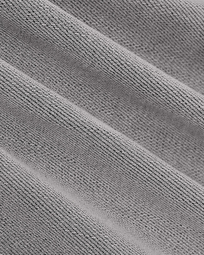 Comfort Denim fabric close-up showing diagonal twill texture.