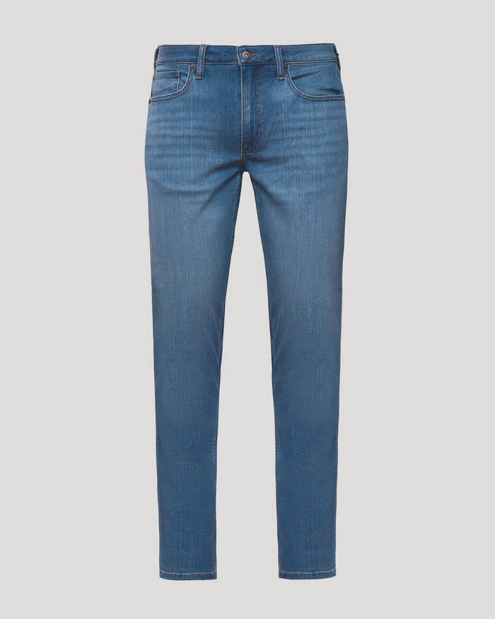 Medium Indigo Wash Slim Comfort Stretch Jeans with five pockets and tapered legs.