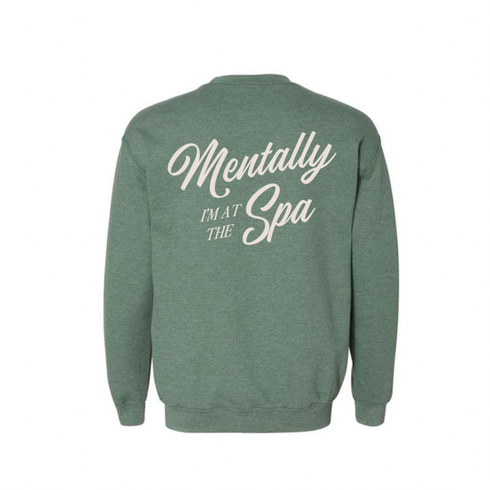 Back view of a green sweatshirt with the phrase "Mentally I'm At The Spa" printed in large, elegant white script, Mentally I’m At The Spa Unisex Crew Neck Sweatshirt | Lucky Owl.