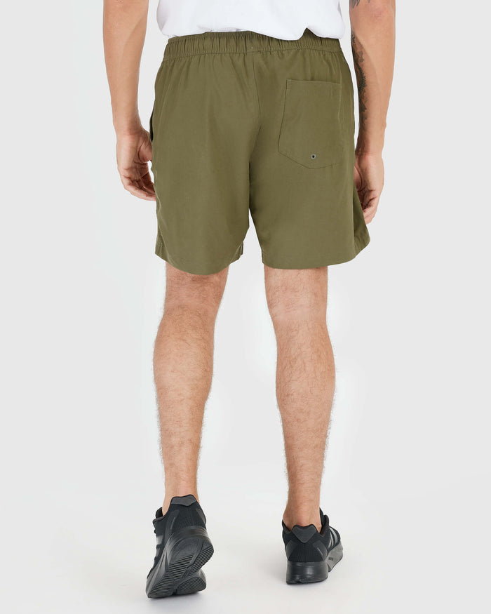 Man wearing Military Green Active Quick Dry Shorts with Liner, back view.