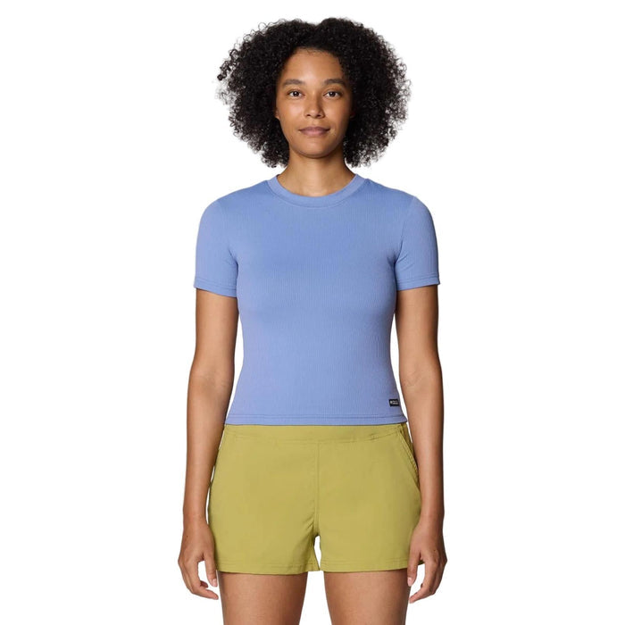 Woman wearing a light blue ribbed short-sleeve Mountain Hardwear Peak Knit Tee with a crew neck.